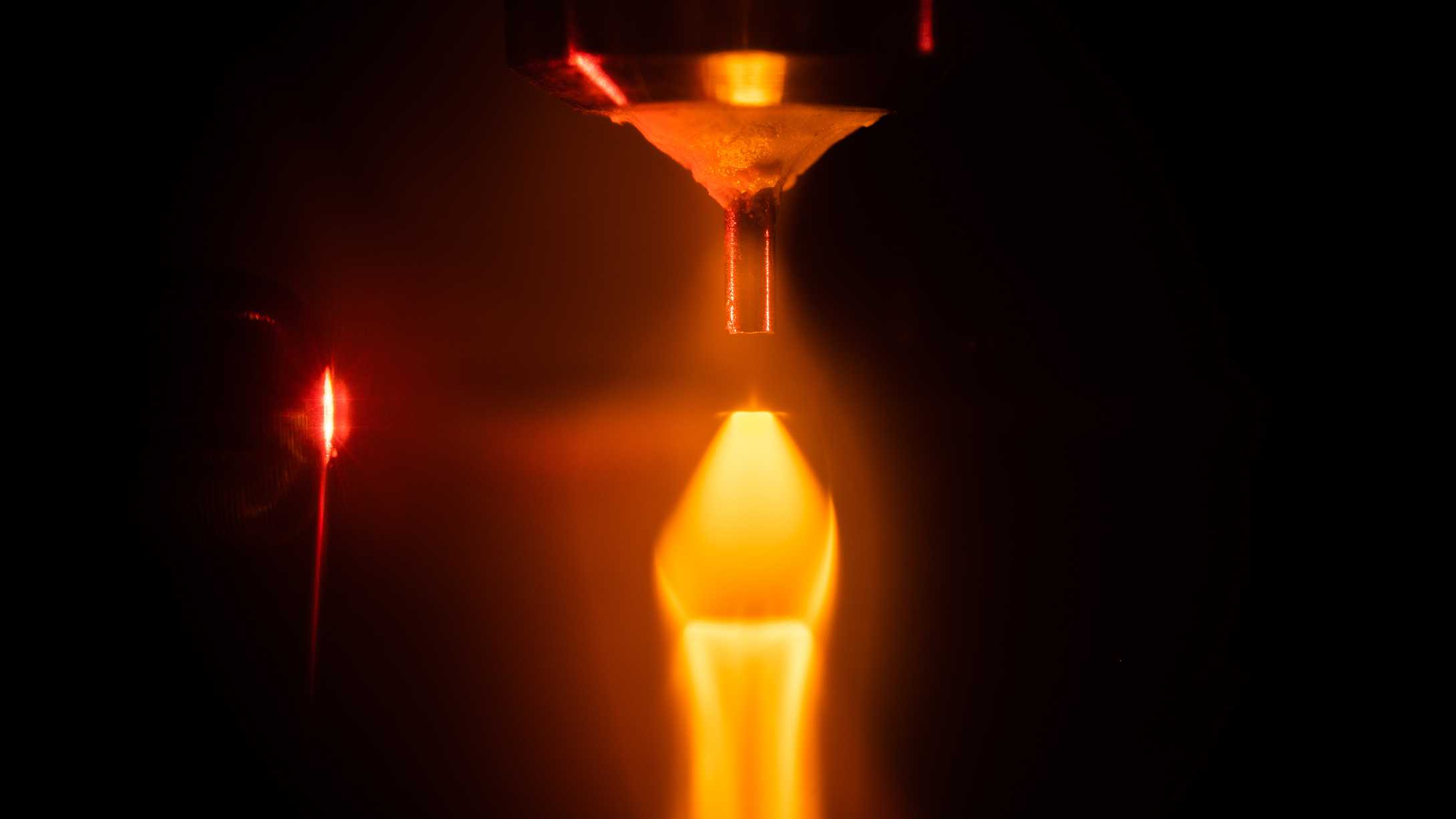 Intense laser generating glowing plasma in a gas